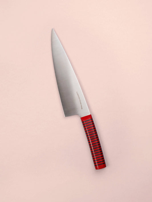 Handcrafted in Barcelona, this chef knife blends high-carbon steel and stacked handle for balance, control, and precision. Perfect for daily prep.