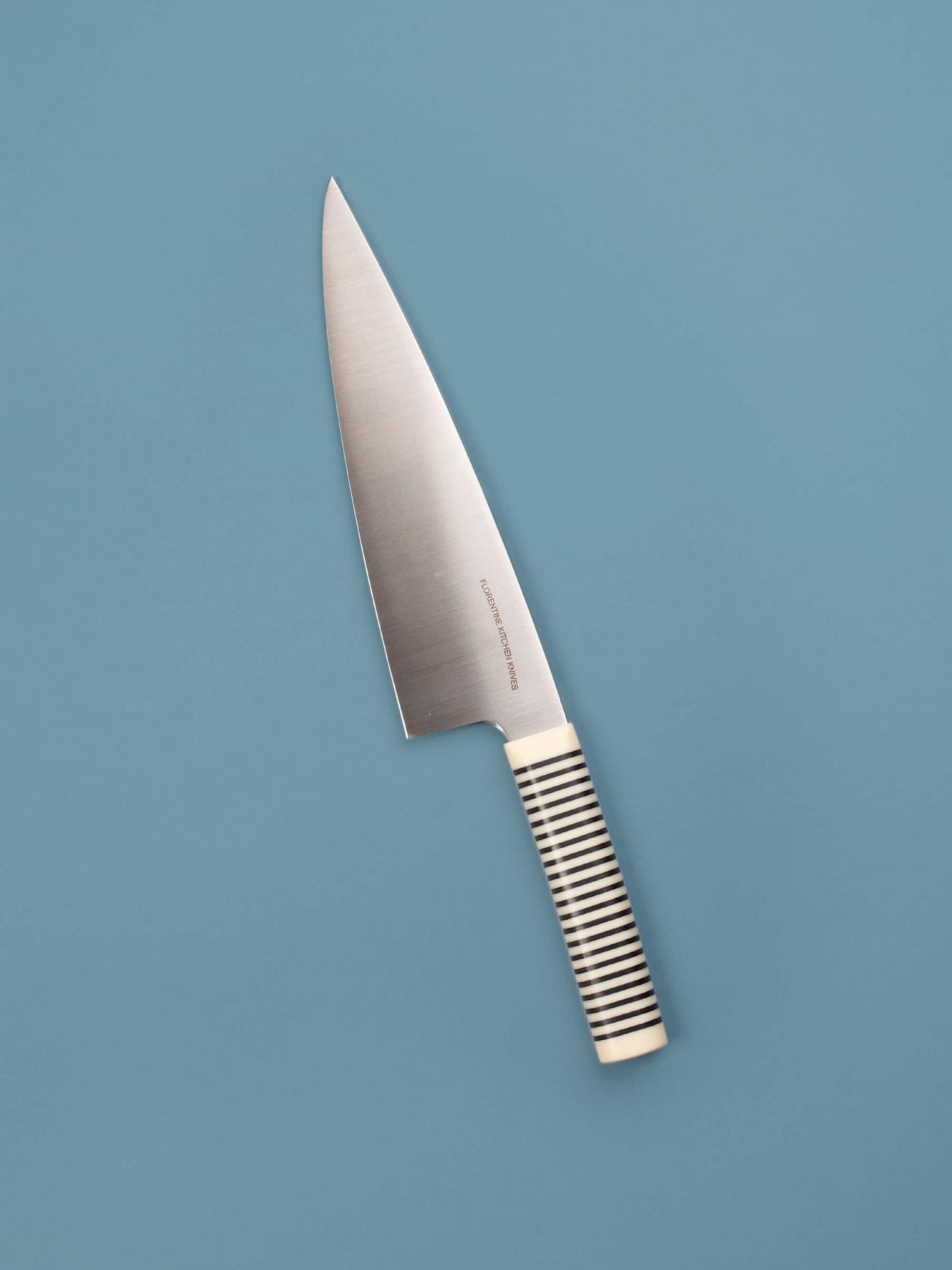 Handcrafted in Barcelona, this chef knife blends high-carbon steel and stacked handle for balance, control, and precision. Perfect for daily prep.