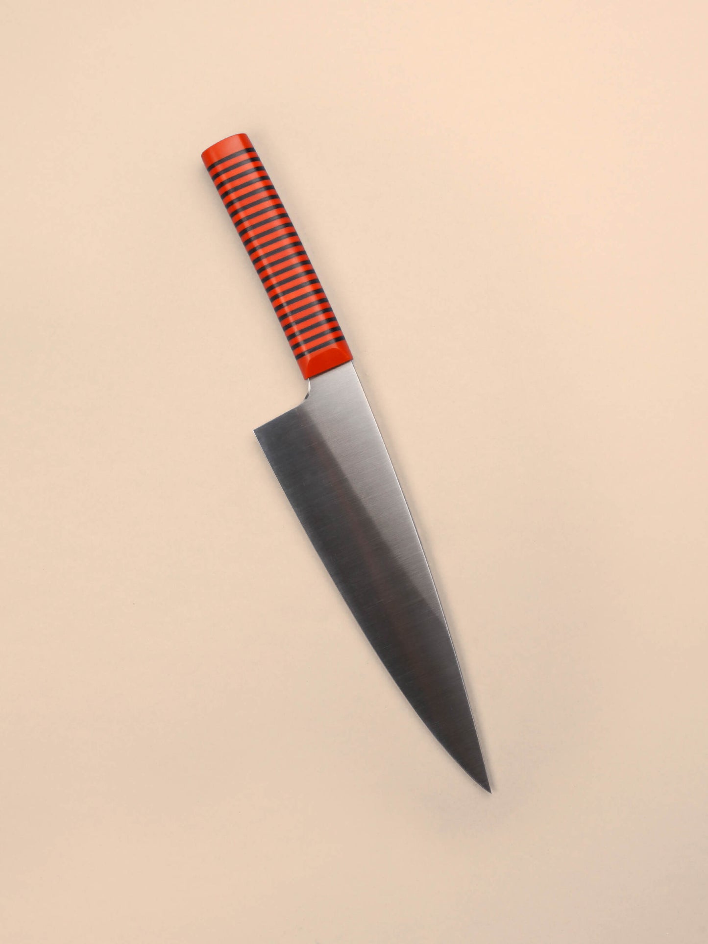 Handcrafted in Barcelona, this chef knife blends high-carbon steel and stacked handle for balance, control, and precision. Perfect for daily prep.