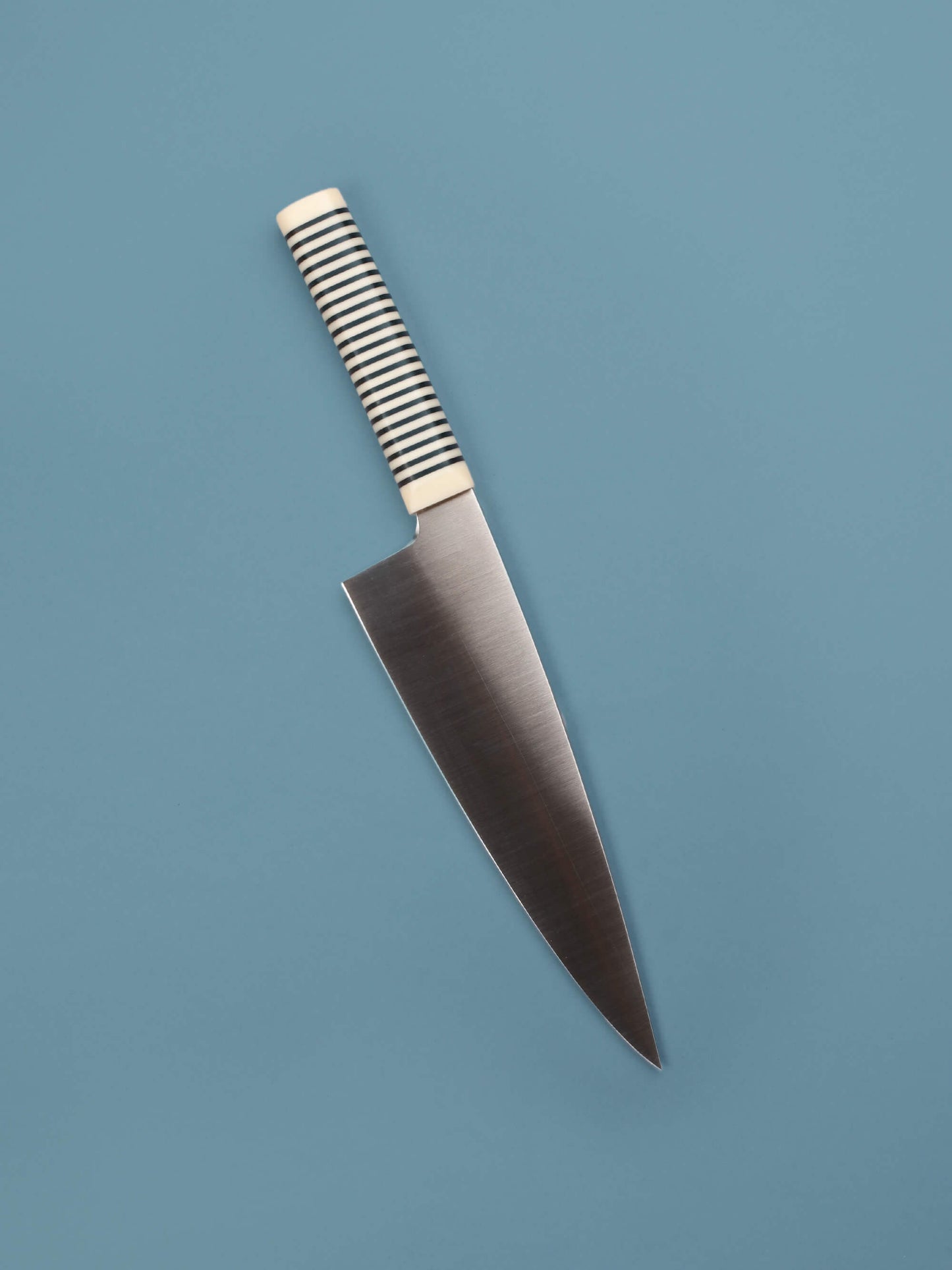 Handcrafted in Barcelona, this chef knife blends high-carbon steel and stacked handle for balance, control, and precision. Perfect for daily prep.