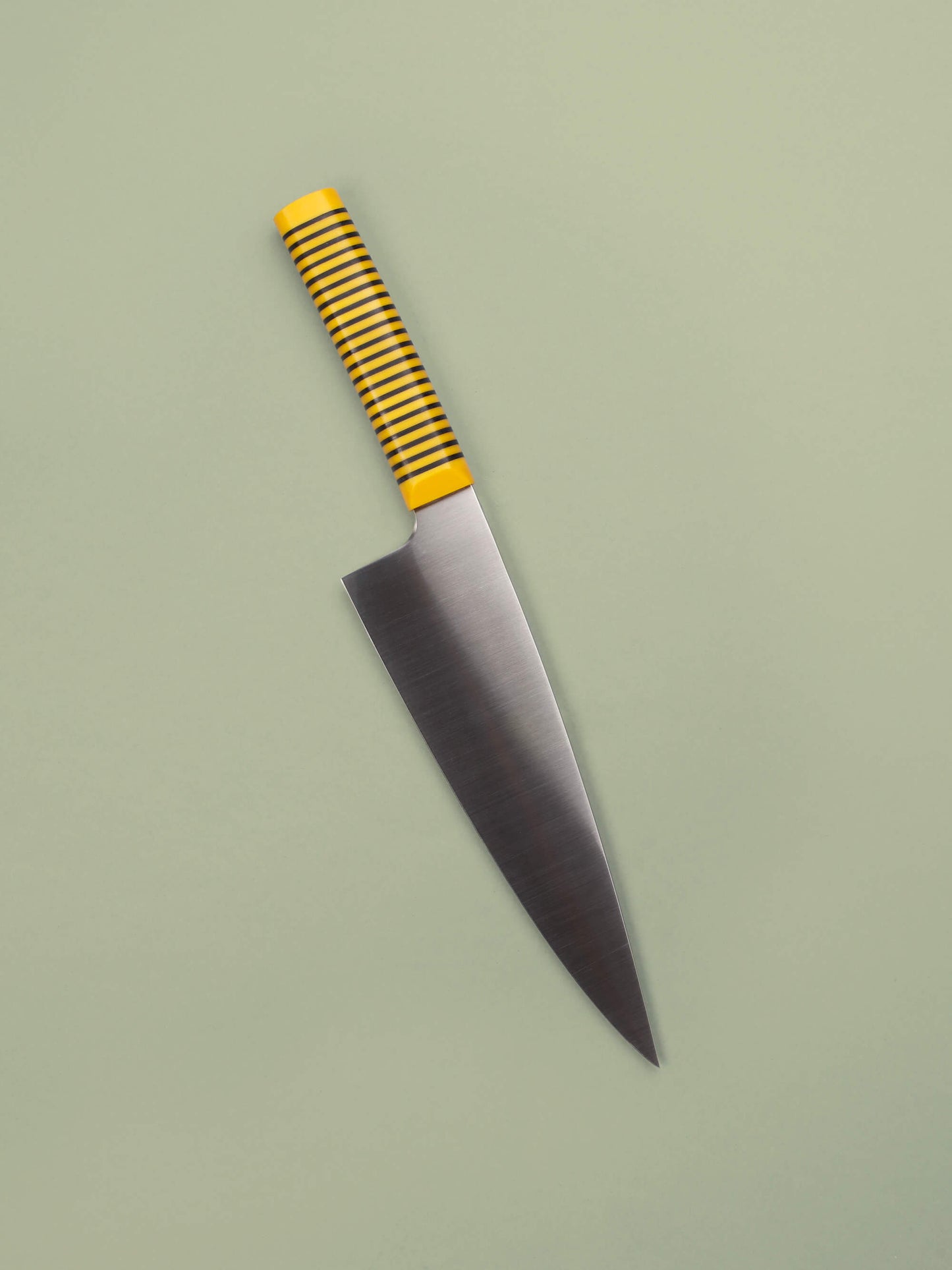 Handcrafted in Barcelona, this chef knife blends high-carbon steel and stacked handle for balance, control, and precision. Perfect for daily prep.