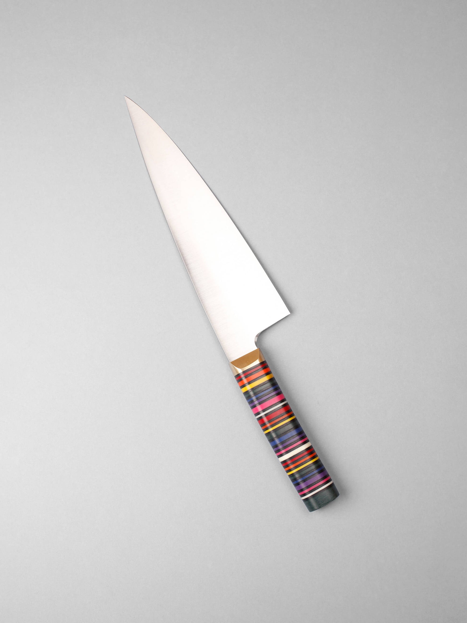 Handcrafted in Barcelona, this chef knife blends high-carbon steel and stacked handle for balance, control, and precision. Perfect for daily prep.