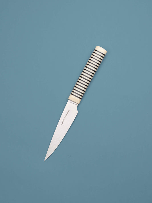 A compact knife for peeling and detail work. Made in Barcelona with high-carbon steel and stacked handles. Sharp, precise, and built to last.