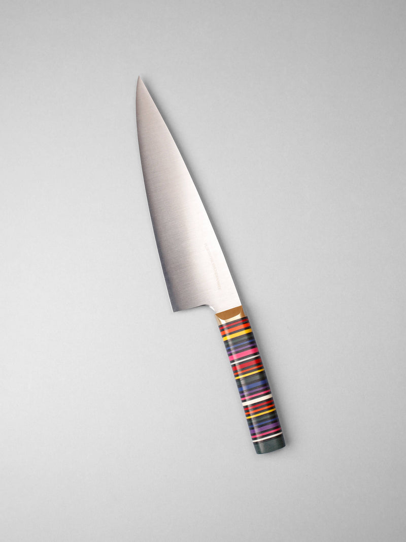 Handcrafted in Barcelona, this chef knife blends high-carbon steel and stacked handle for balance, control, and precision. Perfect for daily prep.